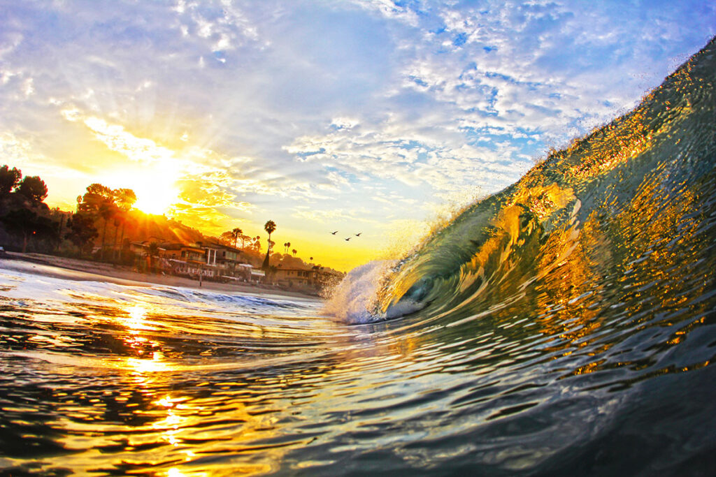 Sun shining bright lighting up this beautiful wave in Southern California.