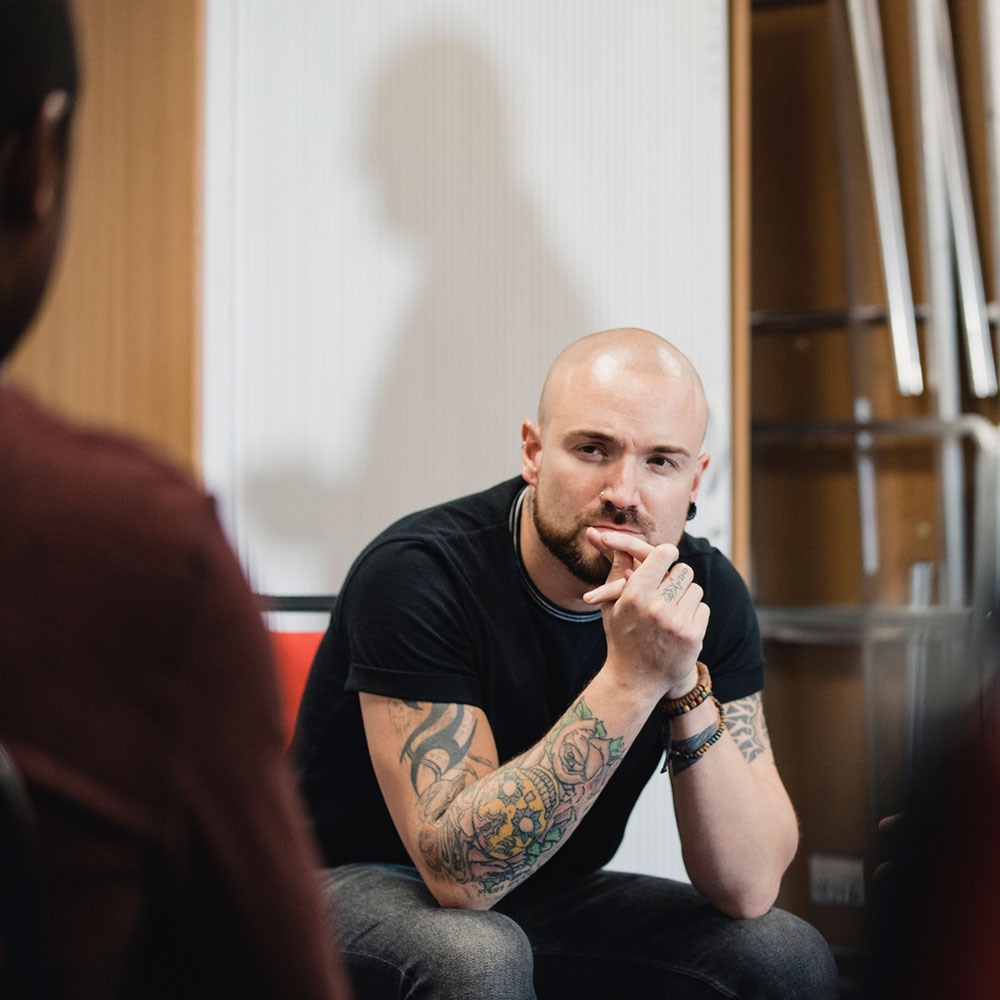 Men Listening in a Support Group